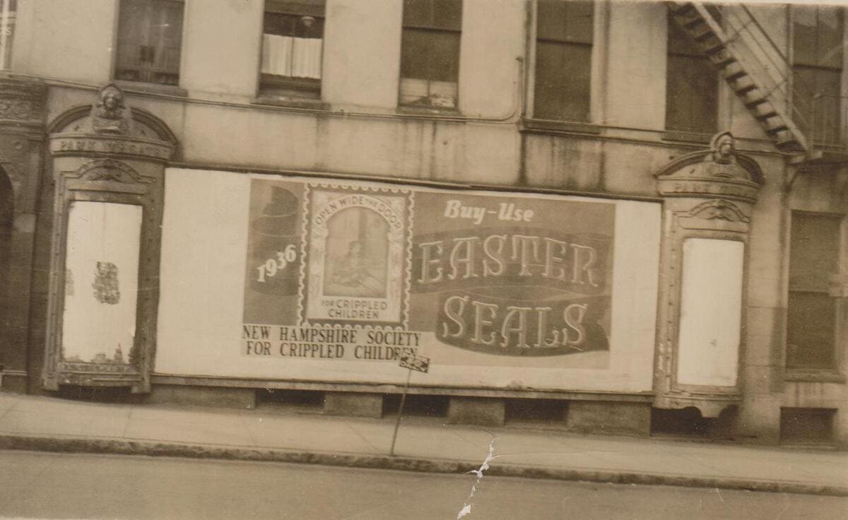A billboard promotes buying Easter seals to support the efforts of the New Hampshire Society for Crippled Children, the original name of Easterseals.