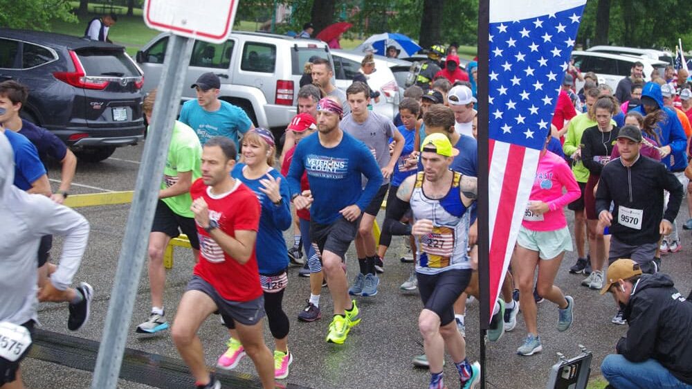 Runners at the starting line at the 2021 Pack n Boots event.