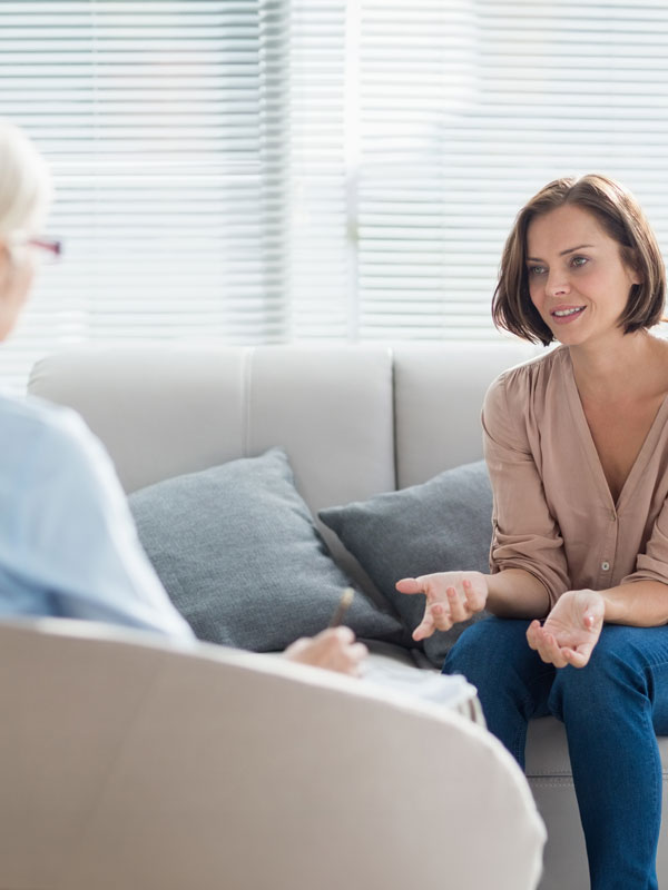 Woman talking to therapist